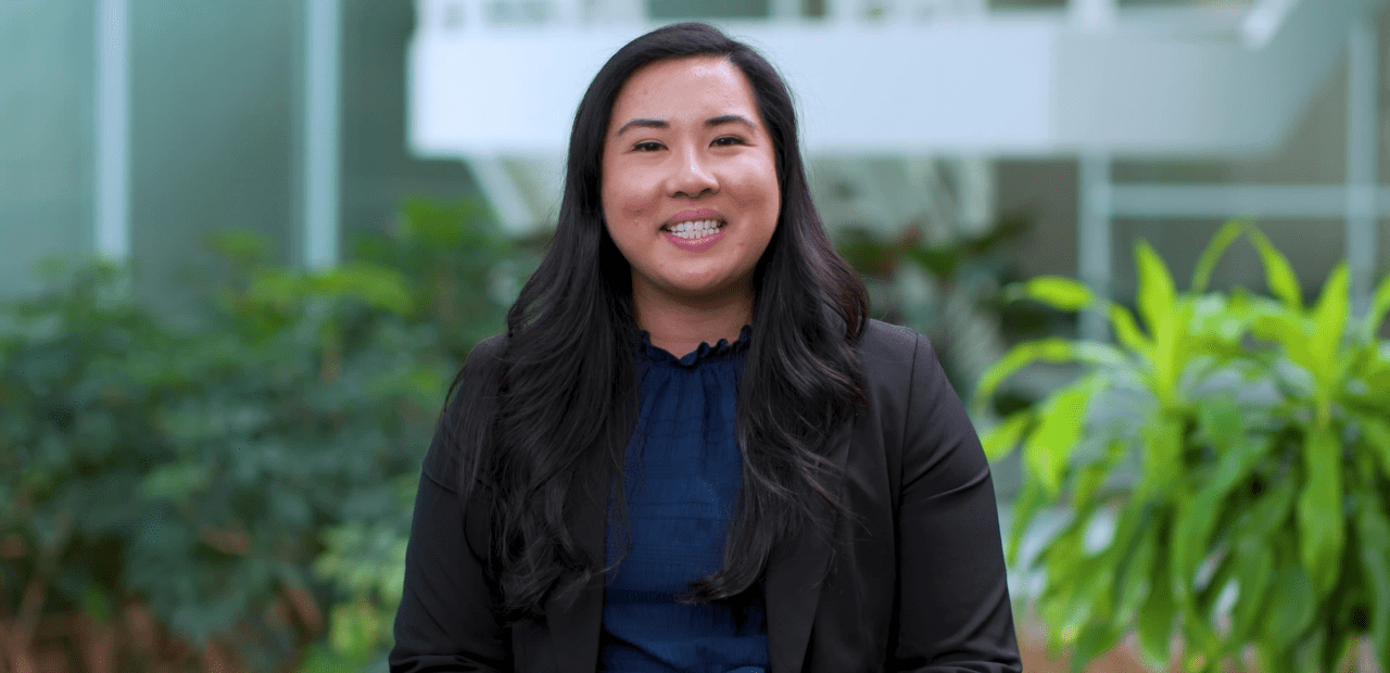 Headshot of Melissa Keung wearing a navy blouse with a black blazer